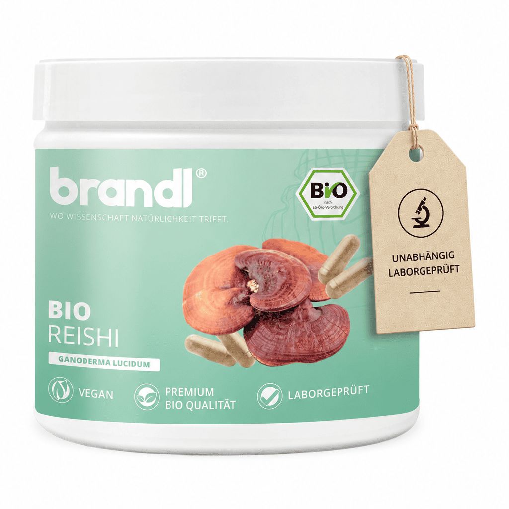 Behälter mit brandl® Bio Reishi Vitalpilz, daneben Kapseln und Anhänger mit Text: unabhängig laborgeprüft. Text: vegan.