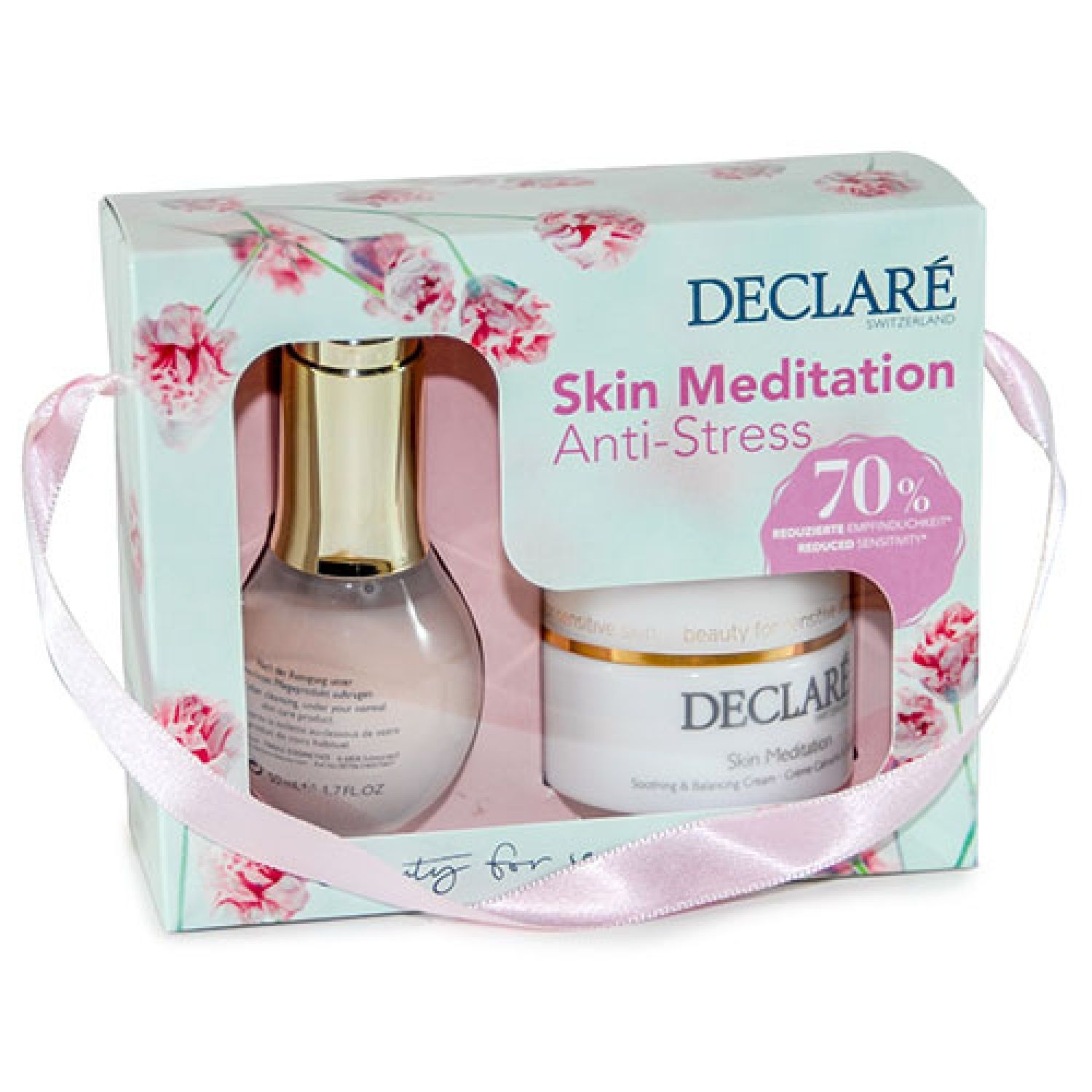 Geschenkbox mit zwei DECLARÉ Skin Meditation Anti-Stress Produkten. Enthält Serum und Creme, verpackt mit rosa Schleife.
