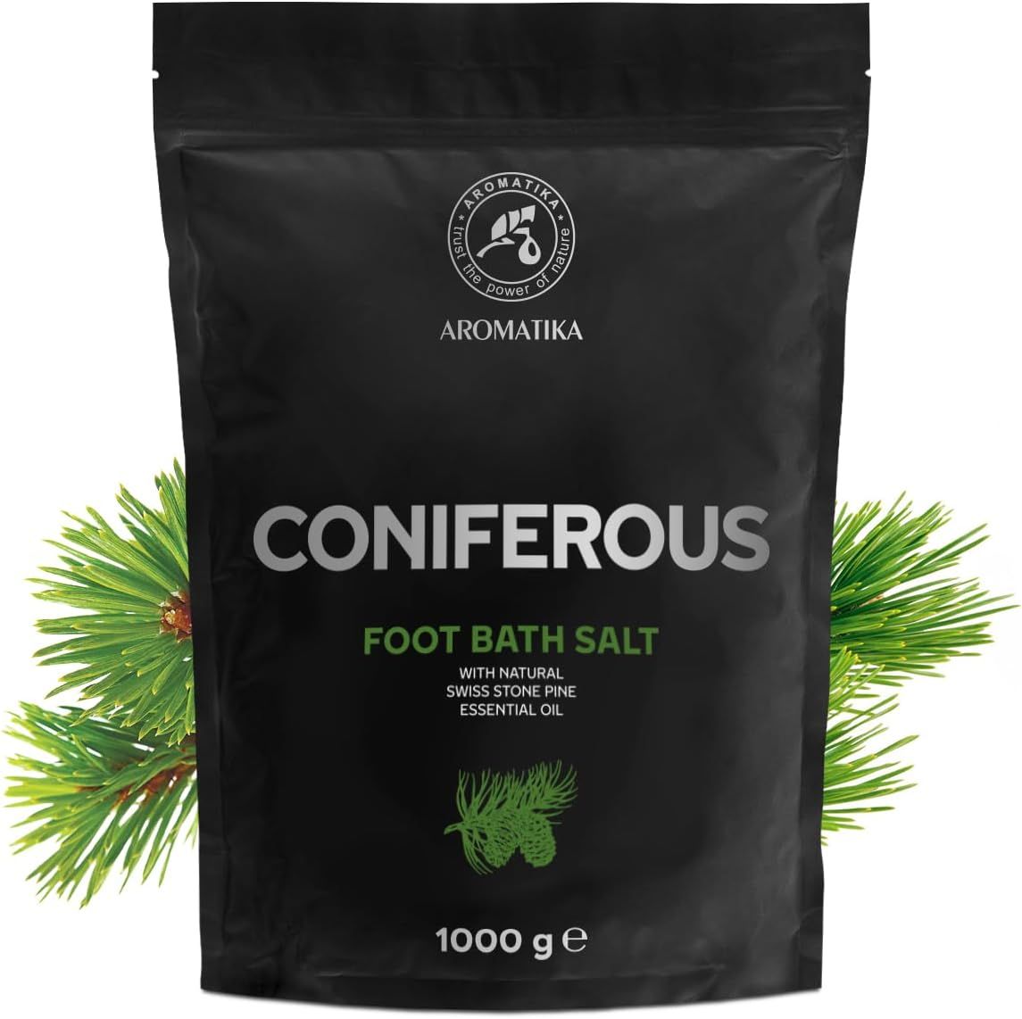 Schwarze Verpackung mit Produktnamen CONIFEROUS und AROMATIKA-Logo. Enthält Fußbadesalz. 1000 g. Kiefernzweig links.