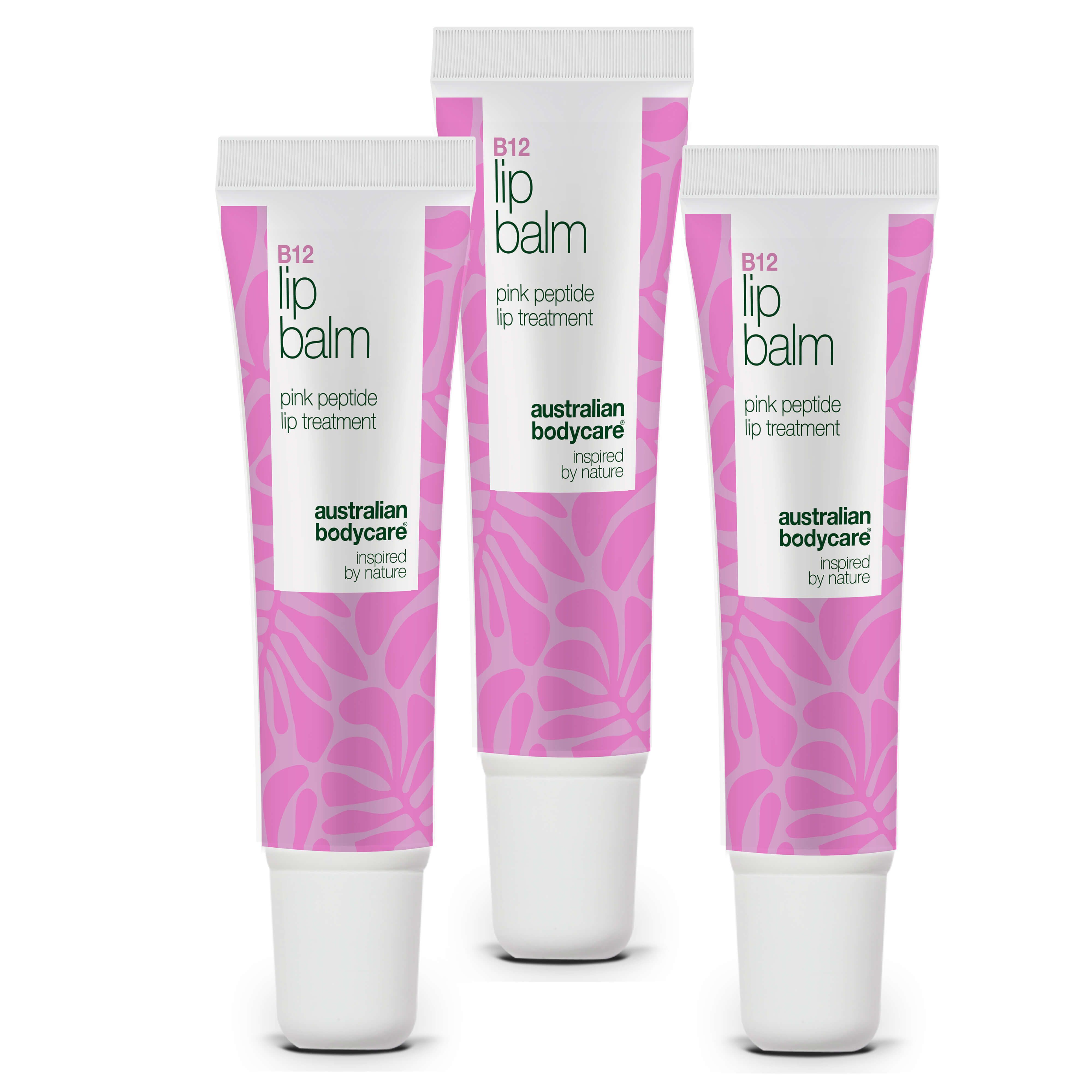 Drei Tuben Lippenbalsam. Weiß-rosa Verpackung mit Text. Marke: Australian Bodycare. B12 Lip Balm.