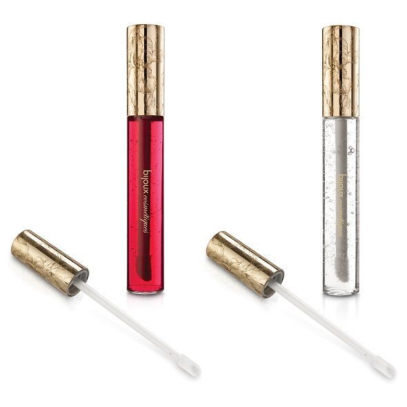 Zwei Lipgloss-Fläschchen, rot und klar, mit goldenen Deckeln und Applikatoren.