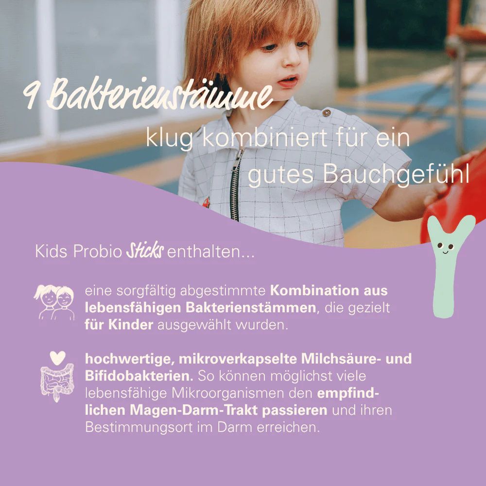 Kind mit Kids Probio Sticks. Enthält 9 Bakterienstämme. Hochwertige, mikroverkapselte Milchsäure- und Bifidobakterien.