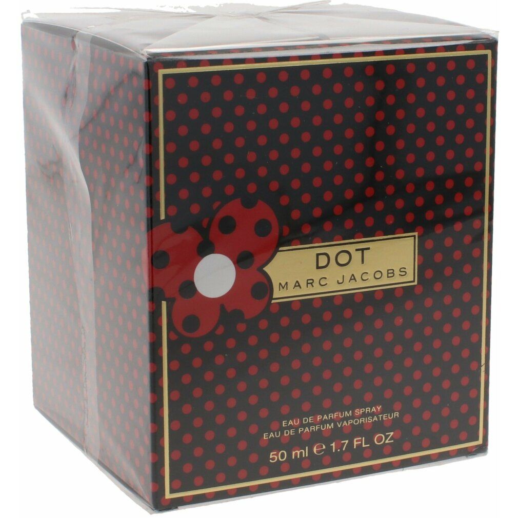 Verpackung von Marc Jacobs Dot Eau de Parfum. Schwarzer Hintergrund mit roten Punkten. Roter Blumen-Akzent. Goldener Schriftzug: DOT, MARC JACOBS. 50 ml.