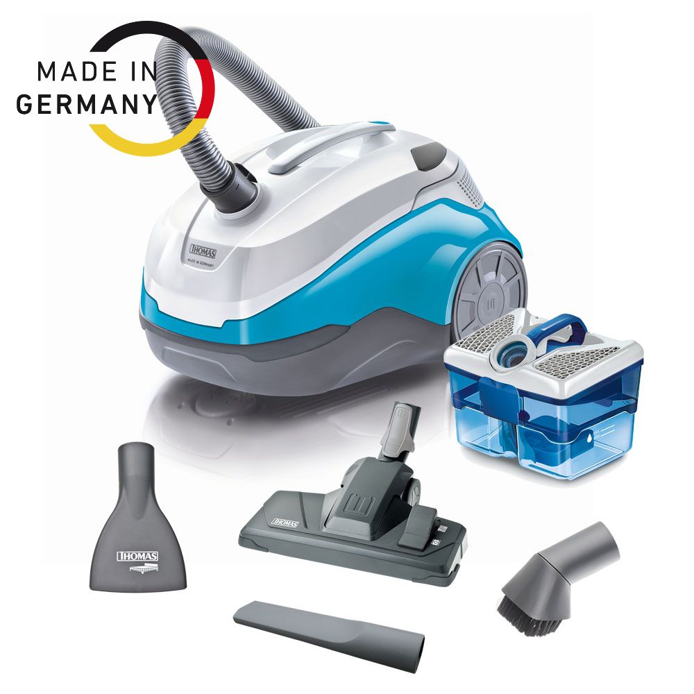 Staubsauger mit Zubehör: Düsen, Behälter. Aufschrift: THOMAS. Made in Germany.