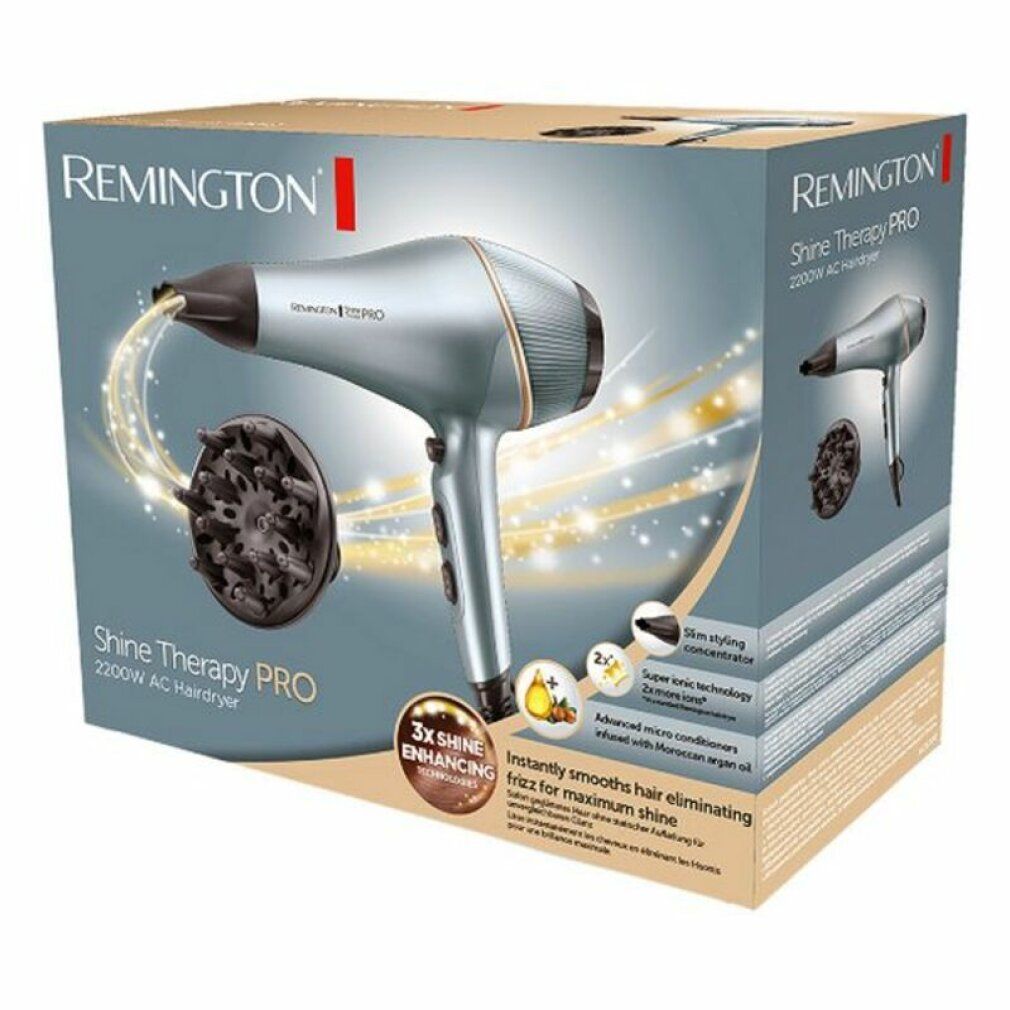 Haartrockner in Verpackung. Marke: Remington Shine Therapy PRO. Zubehör: Diffusor. Text: 2200W, 3x Shine Enhancing.