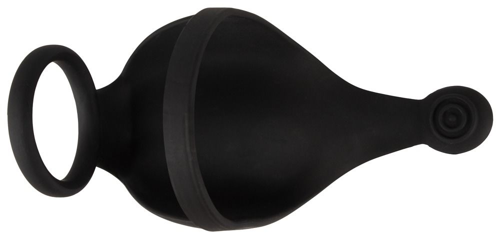 Schwarzer Penis- und Hodenring. Das Produkt hat eine runde Form und eine geschwungene Form. Es ist aus einem weichen Material gefertigt.