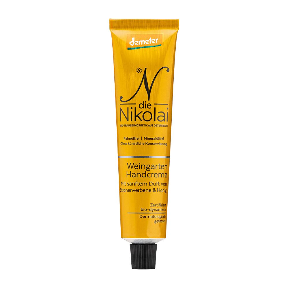 Gelbe Tube mit Demeter-Siegel, "Die Nikolai" Handcreme, "Weingarten Handcreme" Aufschrift.