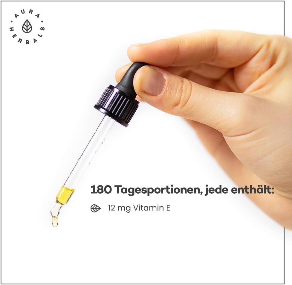 Hand hält Pipette mit gelbem Öl, 180 Tagesportionen, 12 mg Vitamin E pro Portion.