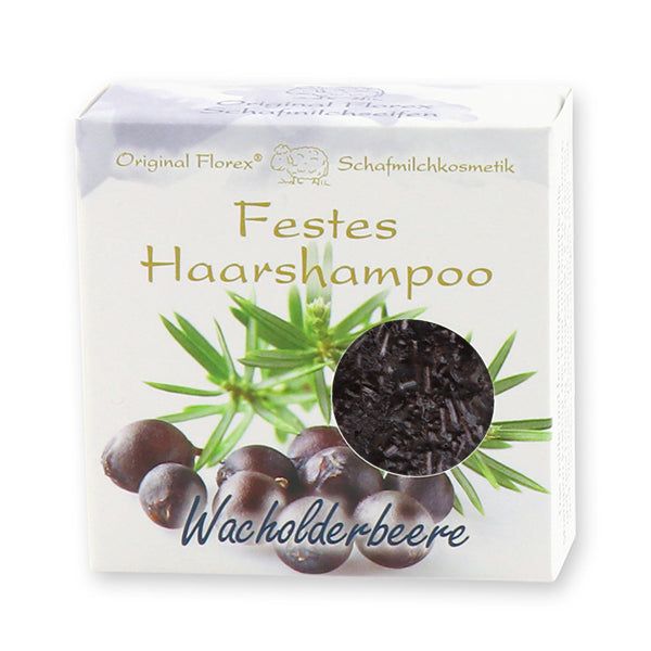 Papierverpackung mit Produktabbildung. Text: Festes Haarshampoo, Wacholderbeere. Logo: Florex, Schafmilchkosmetik.