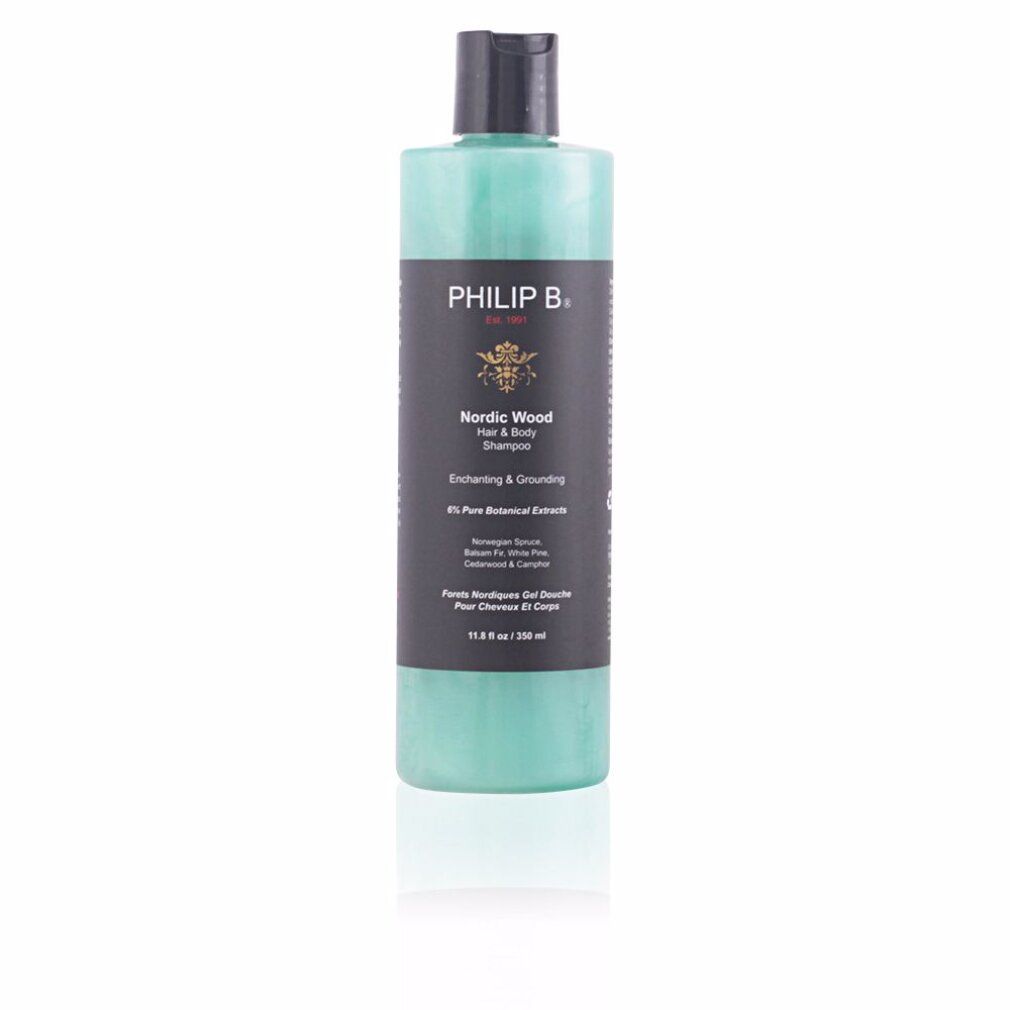 Flasche mit schwarzem Deckel. Aufschrift: PHILIP B. Nordic Wood Hair & Body Shampoo. Grünliche Flüssigkeit sichtbar. 350 ml.