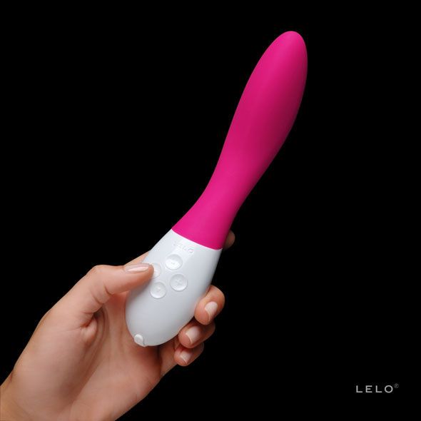 Pink-weißer Vibrator. Geschwungene Form. Vier Knöpfe. LELO-Logo.