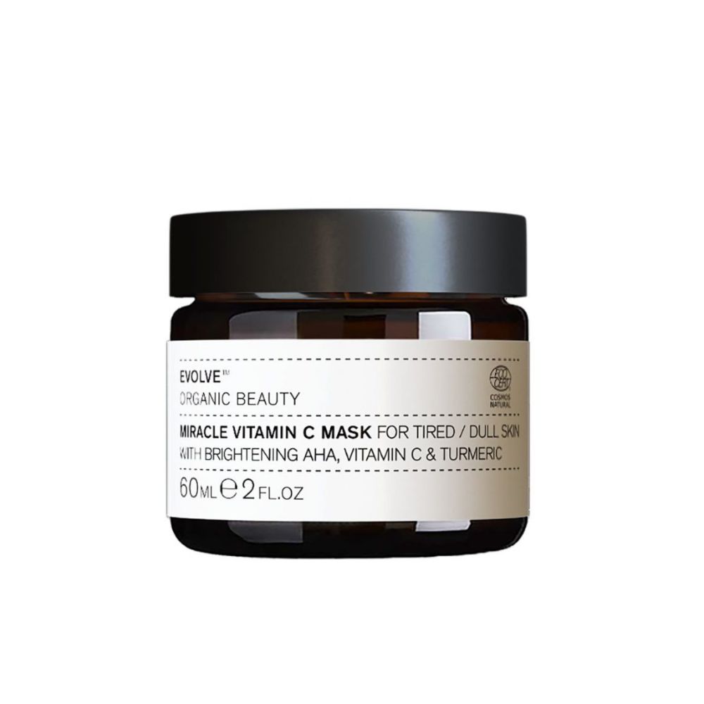 Braune Glasdose mit schwarzem Deckel. Aufschrift: Evolve Organic Beauty, Miracle Vitamin C Mask. Mit AHA, Vitamin C und Kurkuma.