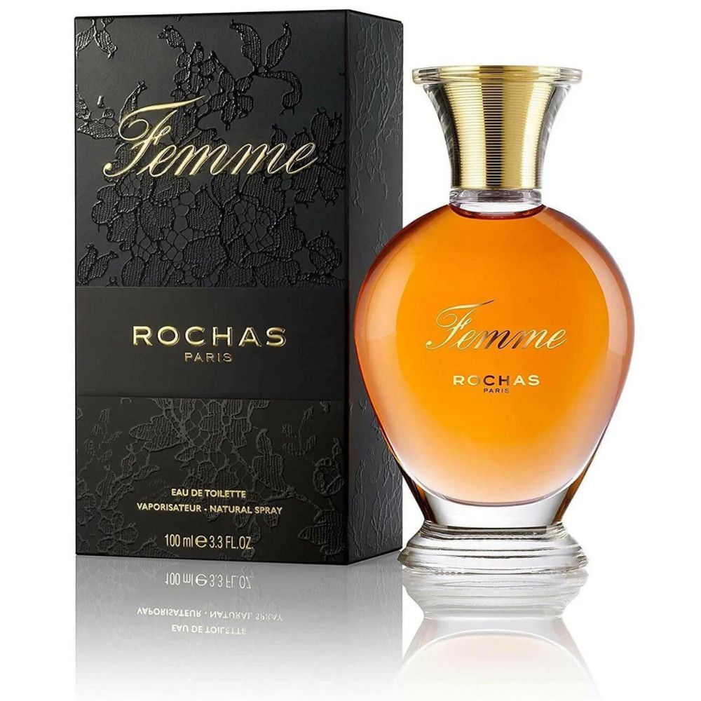 Parfümflakon und -verpackung. Flakon mit goldfarbenem Verschluss, Schriftzug "Femme". Schwarze Verpackung mit Schriftzug "Femme" und "ROCHAS PARIS".