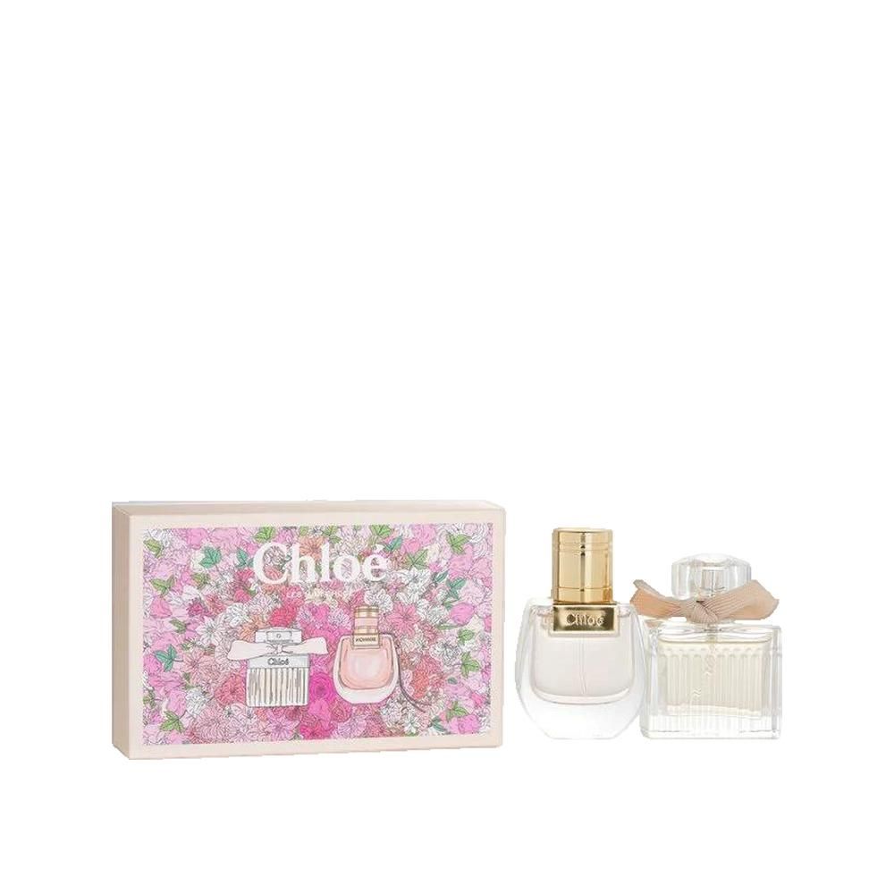 Geschenkset mit zwei Parfümflakons und einer Schachtel mit floralem Muster. Auf der Schachtel steht "Chloé".