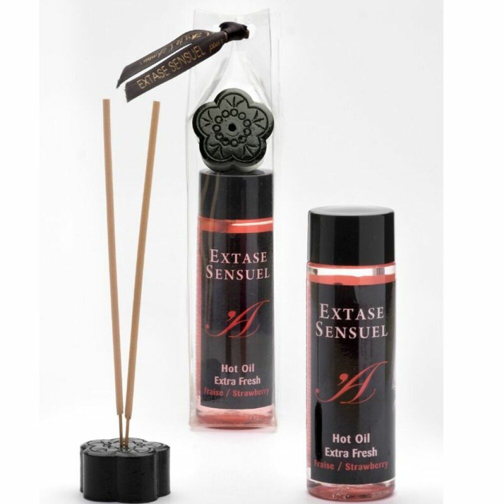 Zwei Flaschen Extase Sensuel Hot Oil Extra Fresh Erdbeere und ein Ständer mit Räucherstäbchen.