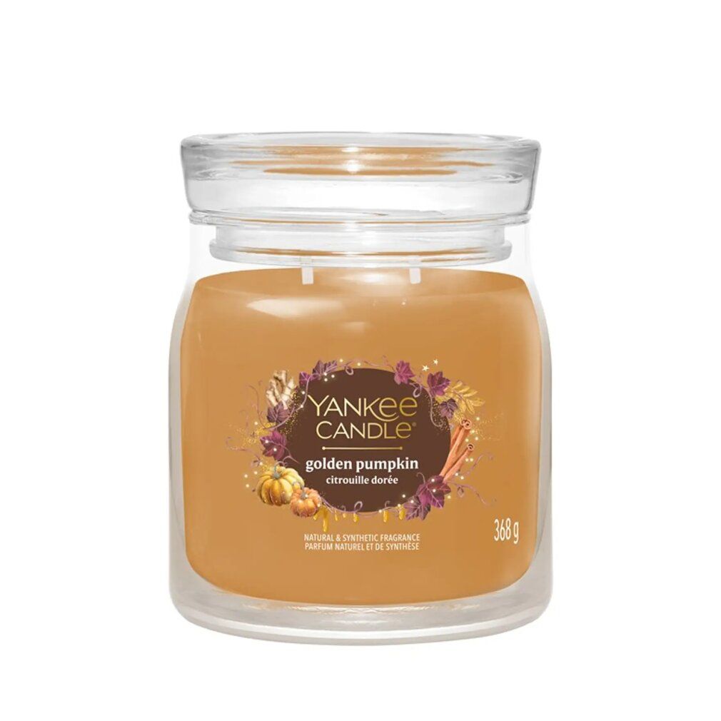 Duftkerze im Glas mit Deckel. Aufschrift: Golden Pumpkin. Gewicht: 368 g. Abbildung: Kürbisse und Blätter.