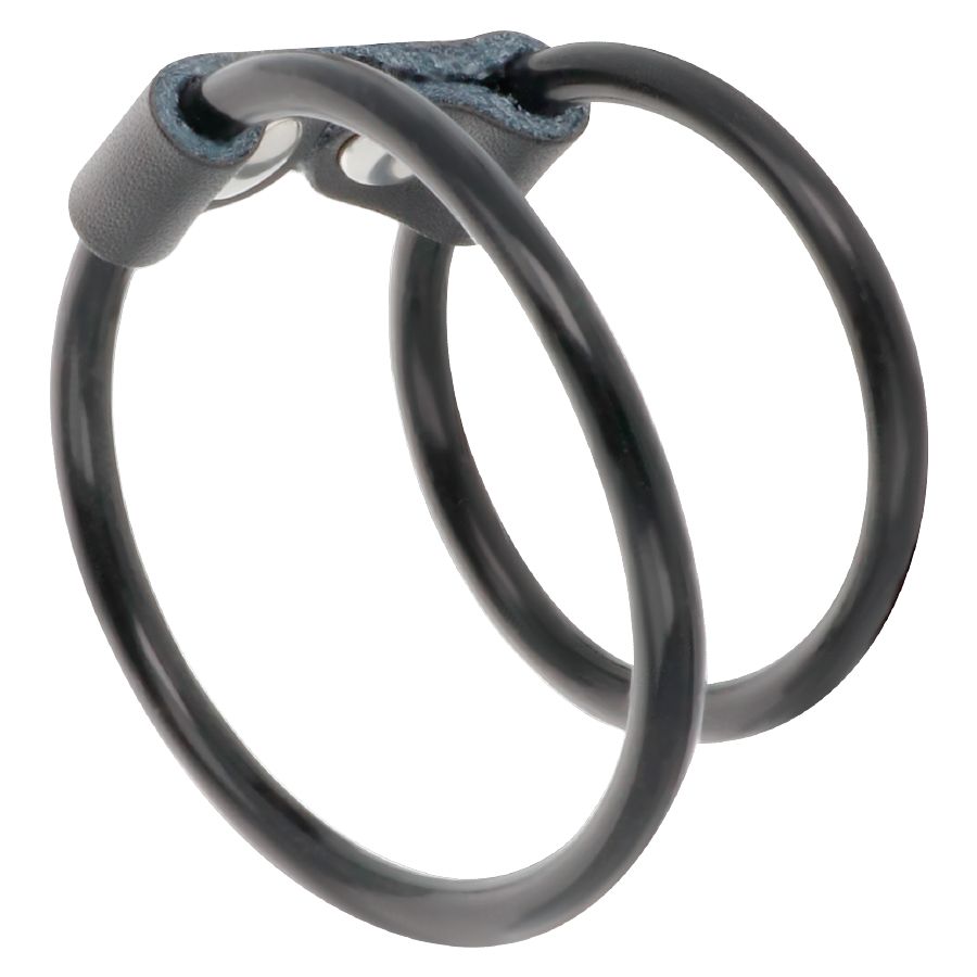 Doppelter Penisring, schwarz. Zwei Ringe, verbunden durch ein Element. Aus Gummi oder ähnlichem Material.