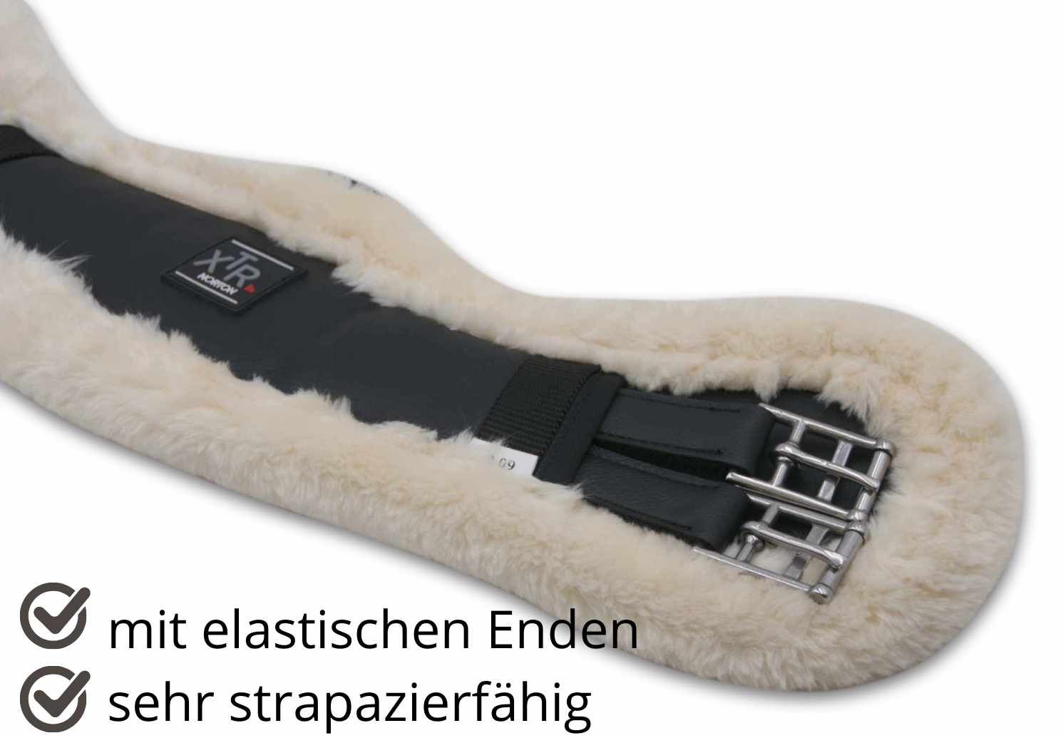 Nahaufnahme des Kurzgurts XTR. Schwarzes Mittelteil, Lammfell, silberne Schnallen. Text: mit elastischen Enden, sehr strapazierfähig.