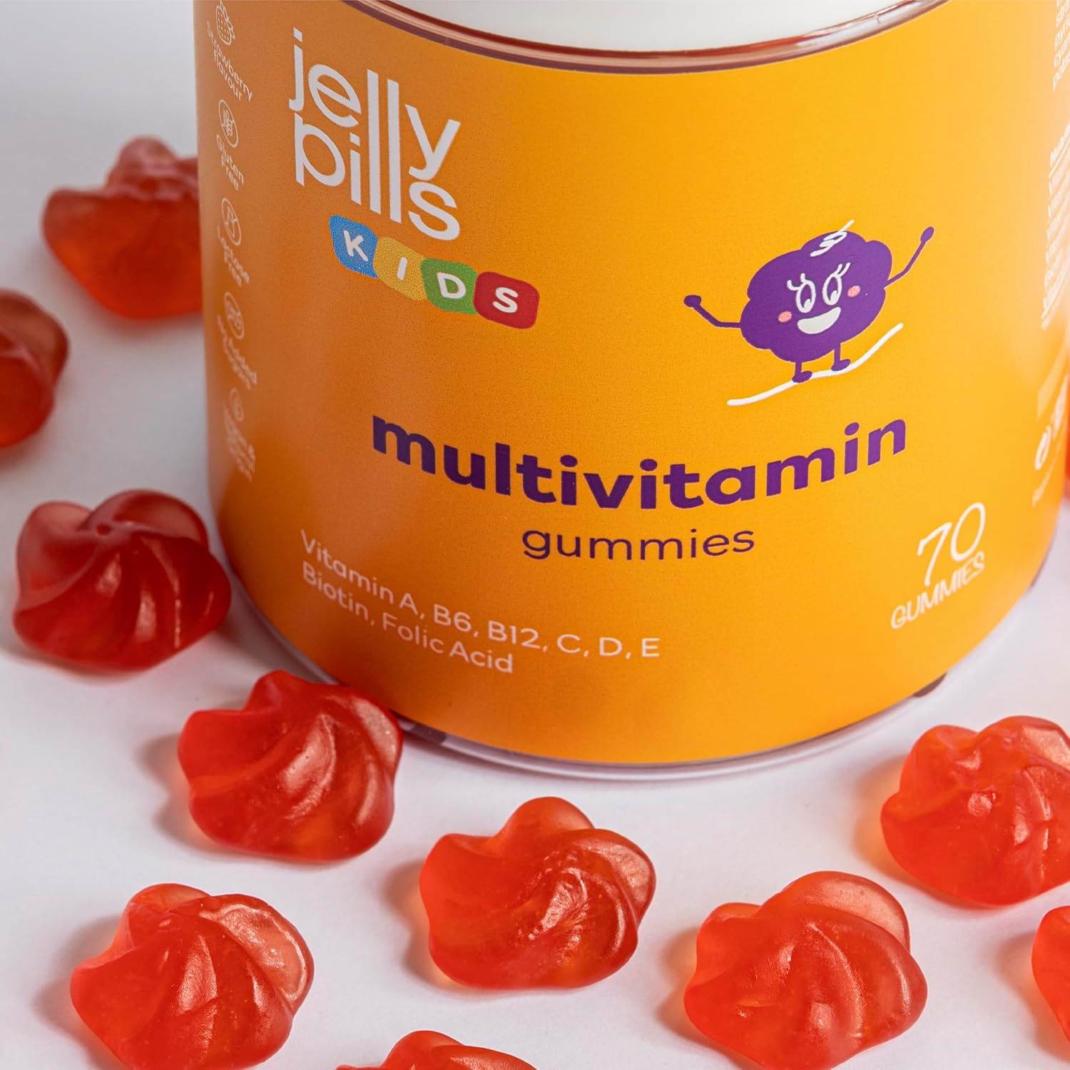 Nahaufnahme von Jelly Pills Kids Multivitamin Gummies. 70 Stück. Rote, spiralförmige Gummibärchen.