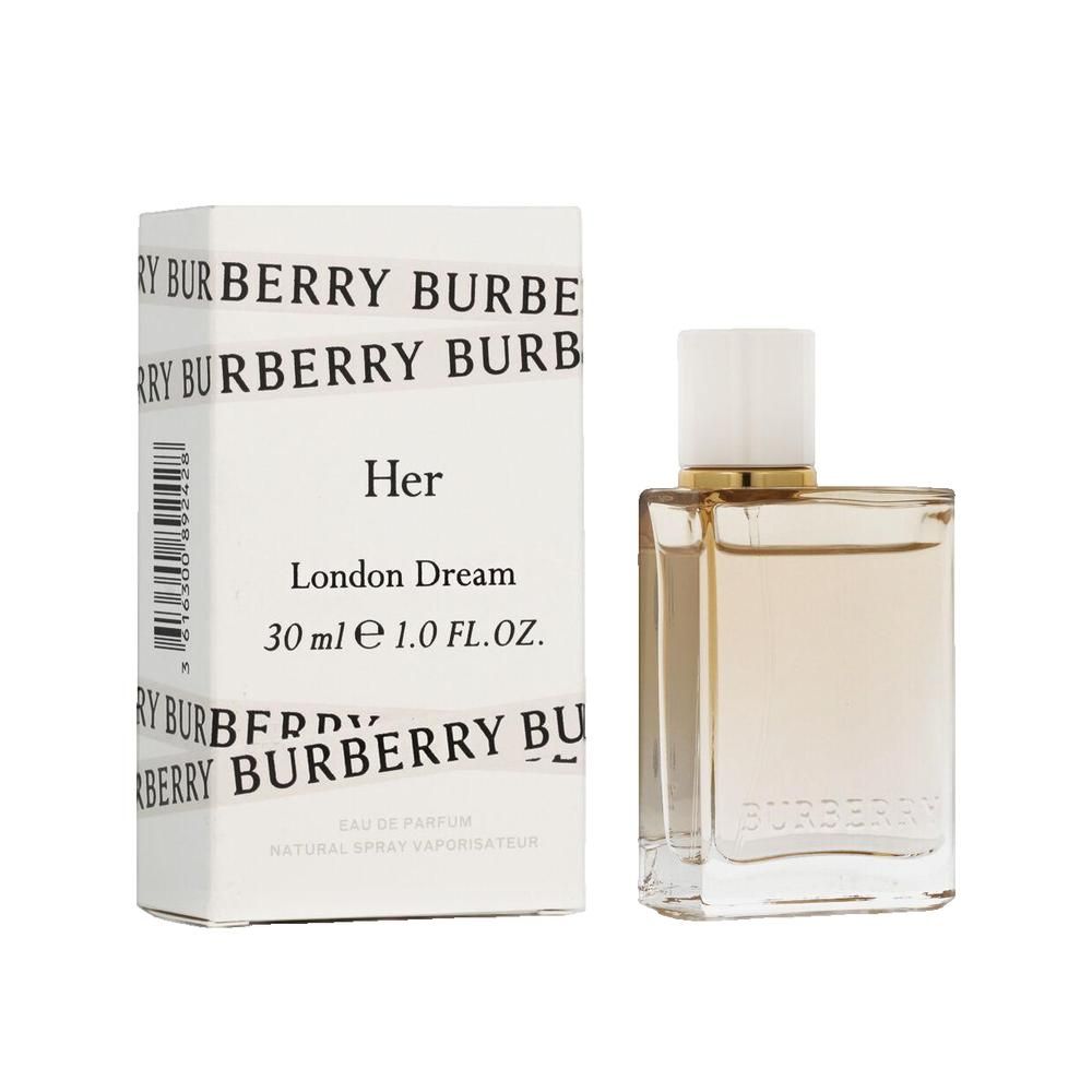 Parfümflakon neben weißer Verpackung. Auf der Verpackung steht "Her London Dream" und "BURBERRY".
