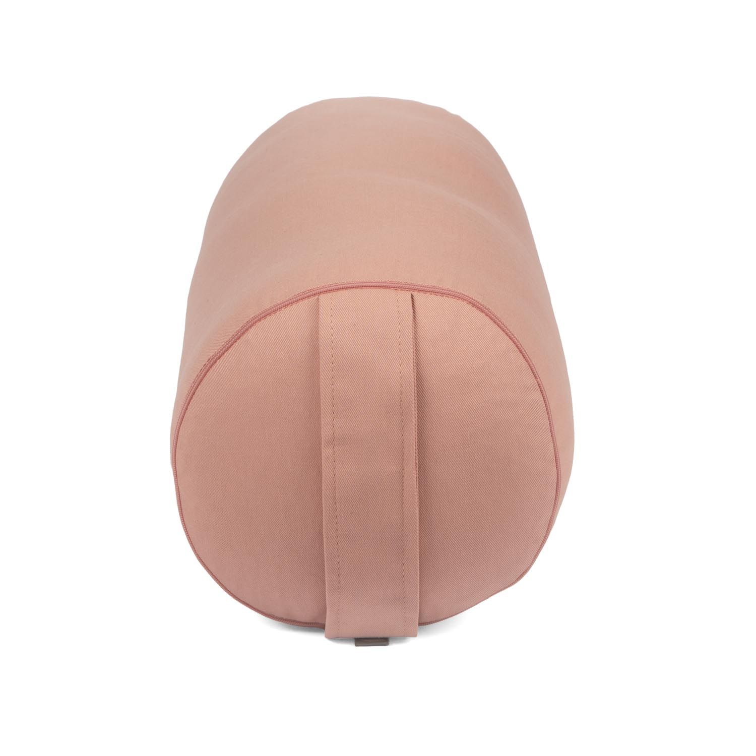 Rosa Yogabolster, zylindrisch. Mit Trageschlaufe. Aus Stoff.