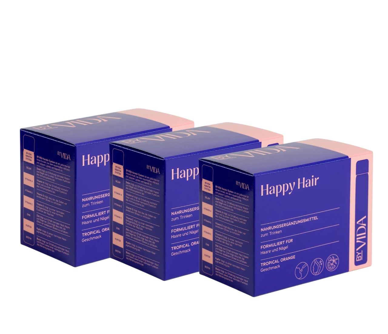Drei blaue Kartons mit rosa Akzenten. Aufschrift: Happy Hair, by VIDA. Enthält Nahrungsergänzungsmittel.