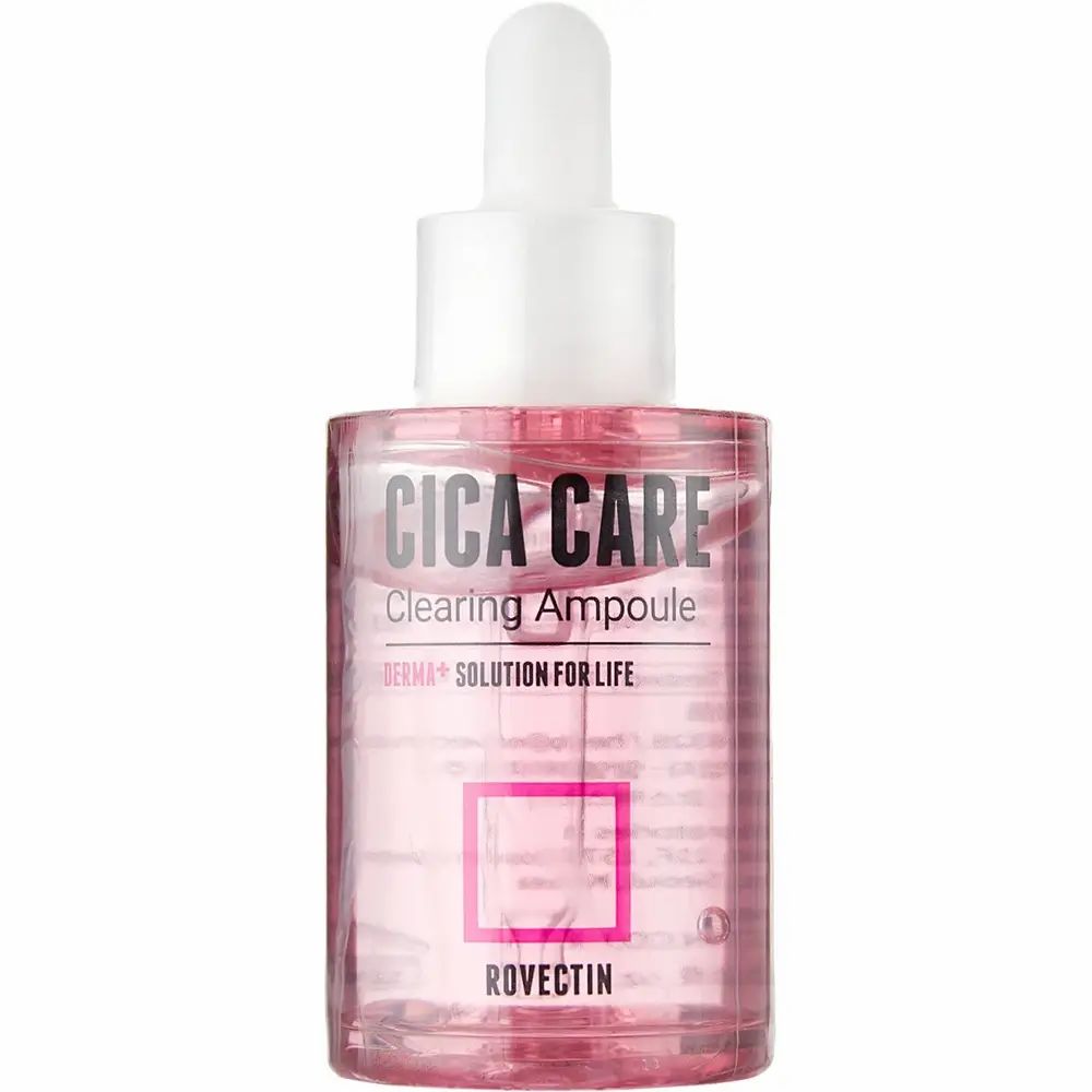 Rosa Serum in einer transparenten Flasche. Aufschrift: Cica Care Clearing Ampoule. Marke: ROVECTIN. Quadratisches Logo.