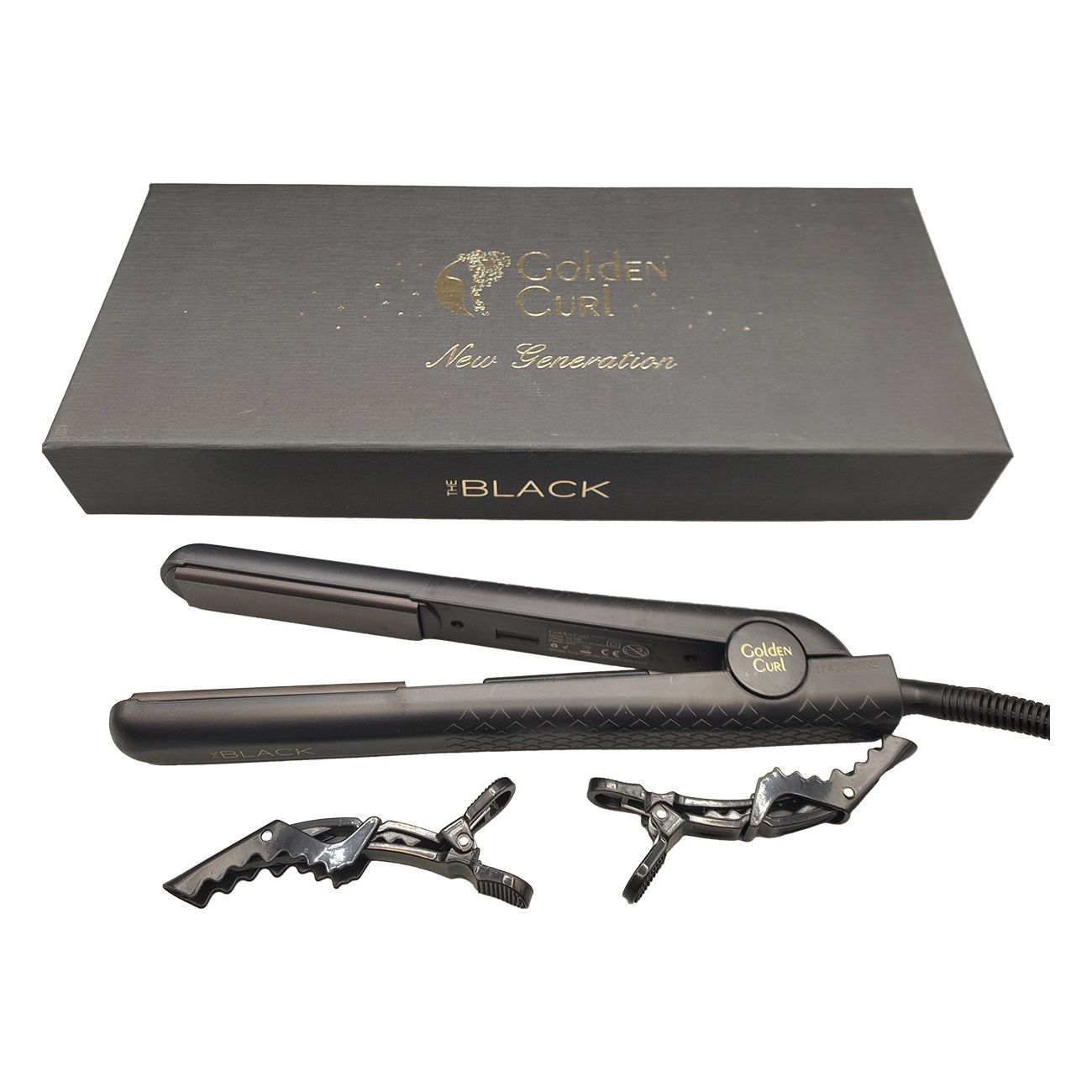Schwarzes Glätteisen, zwei Haarspangen und Schachtel. Logo 'Golden Curl' und 'BLACK' sichtbar.