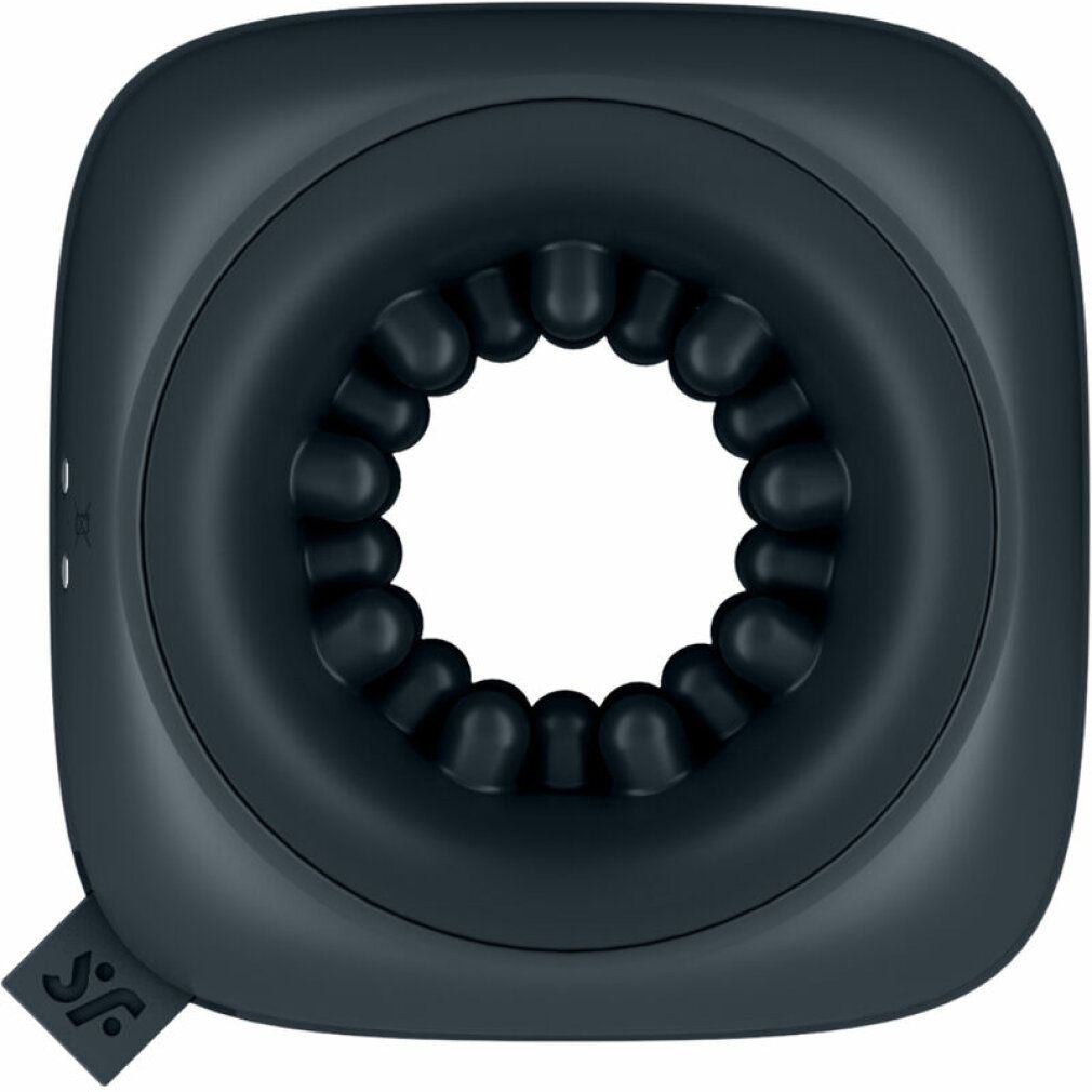 Dunkelgraues Gerät mit ringförmiger Öffnung und Noppen im Inneren. Quadratische Form mit abgerundeten Ecken. Kleines Logo an der Seite.