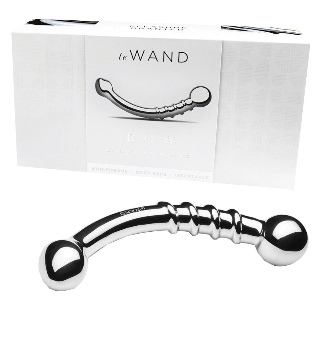 Wellness-Produkt, silberfarben, gebogen, mit zwei Kugeln und geriffeltem Mittelteil. Verpackung mit Logo.