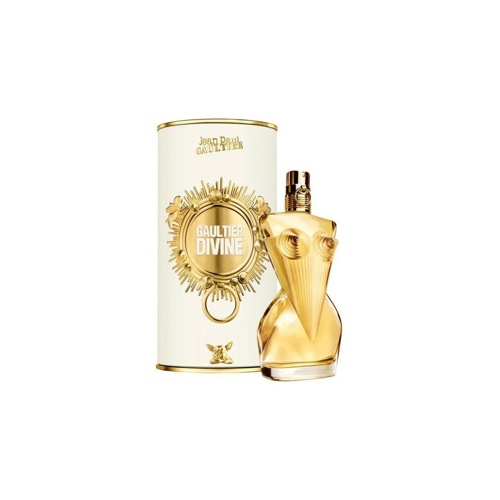 Parfümflakon und Verpackung. Flakon goldfarben, in Form eines Oberkörpers. Verpackung zylindrisch, weiß mit goldenen Details und Schriftzug.