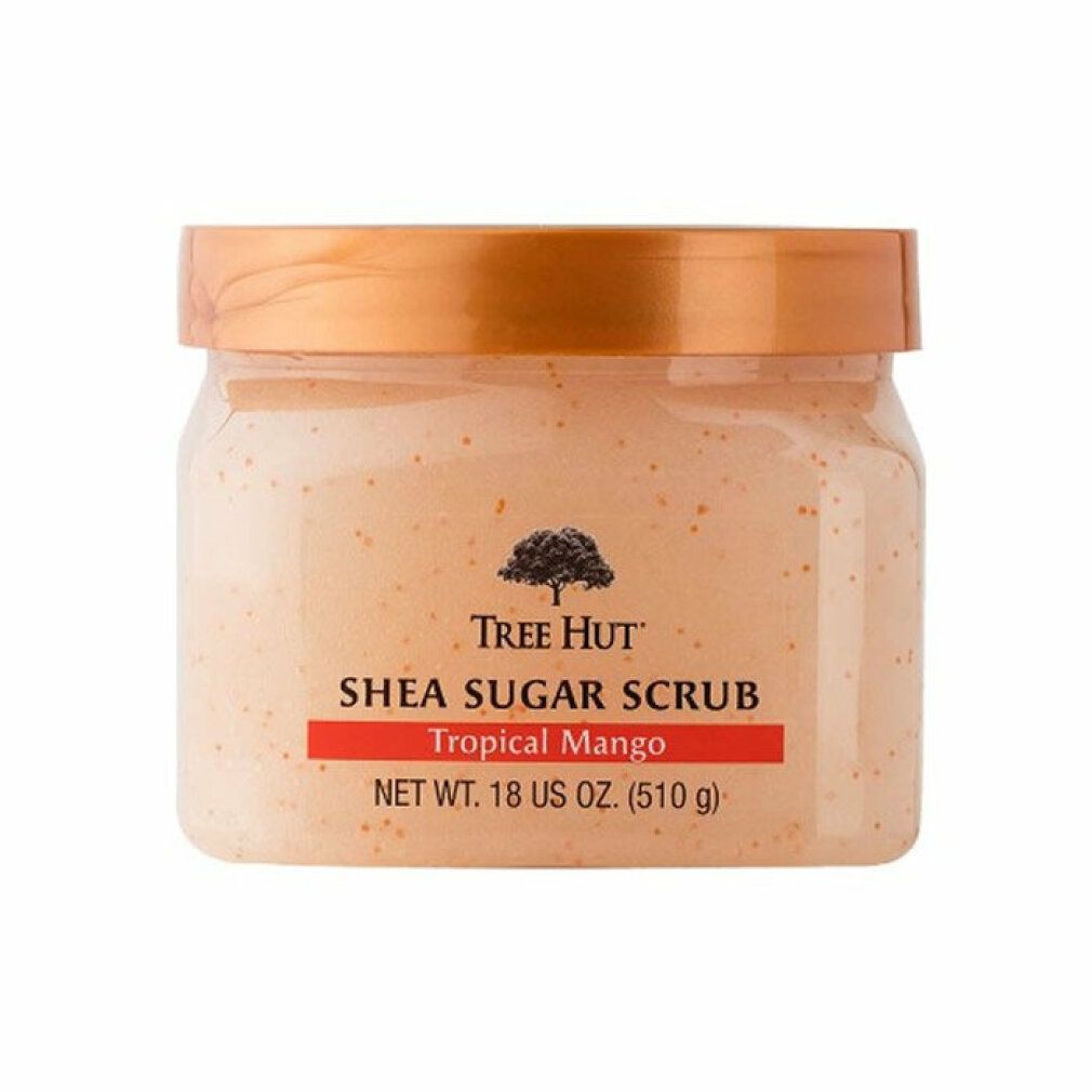 Tree Hut Shea Sugar Scrub Tropical Mango Körperpeeling in einem transparenten Behälter mit orangefarbenem Deckel.