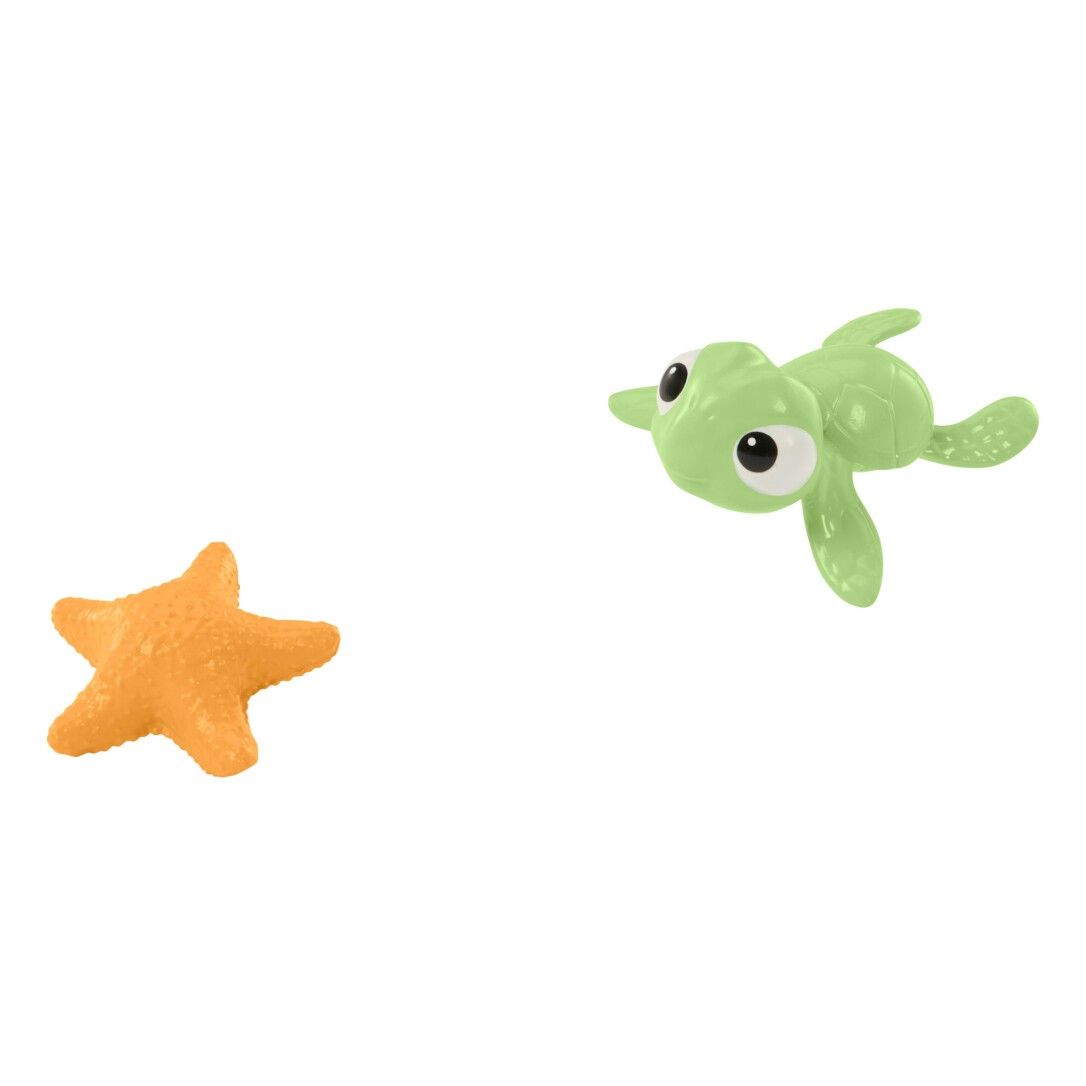 Grüne Schildkröte und orangefarbener Seestern. Beide Spielzeuge sind aus Kunststoff.