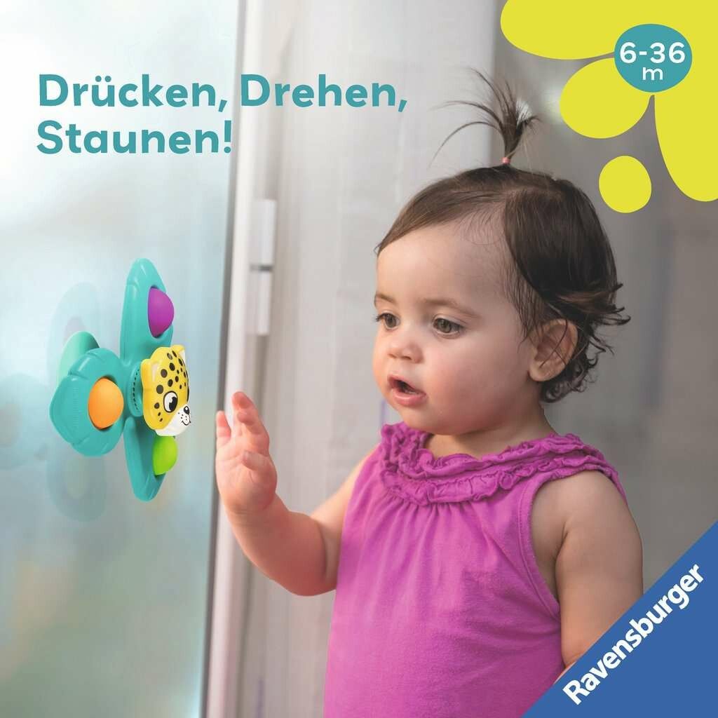 Baby betrachtet Pop-It Spinner mit Affenmotiv, an Glas befestigt. Text: Drücken, Drehen, Staunen! Altersempfehlung: 6-36 Monate.