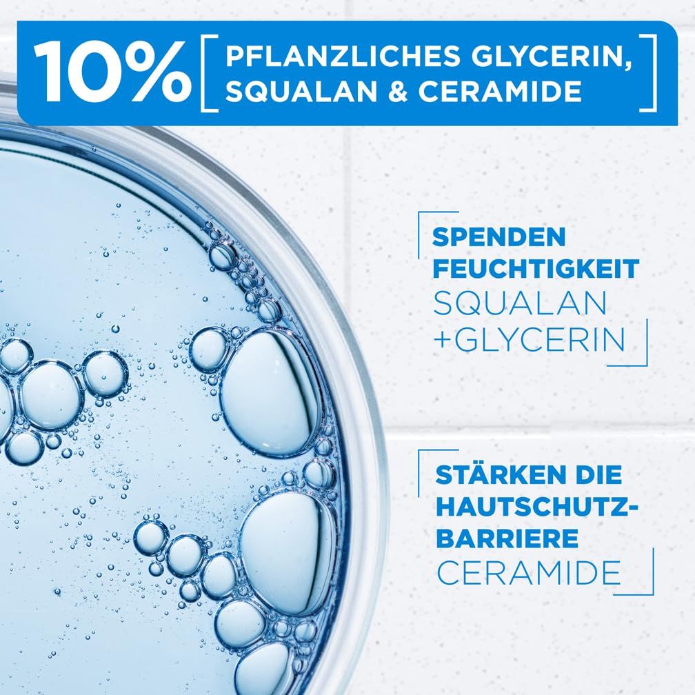 Nahaufnahme: Flüssigkeit mit Blasen. Text: Spendet Feuchtigkeit, stärkt die Hautschutzbarriere. Enthält Squalane, Glycerin & Ceramide.