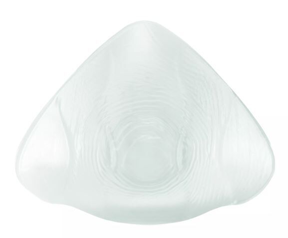 Transparente Bade-Prothese mit geriffelter Oberfläche. Tropfenform mit abgerundeter Oberseite und wellenförmiger Unterseite.