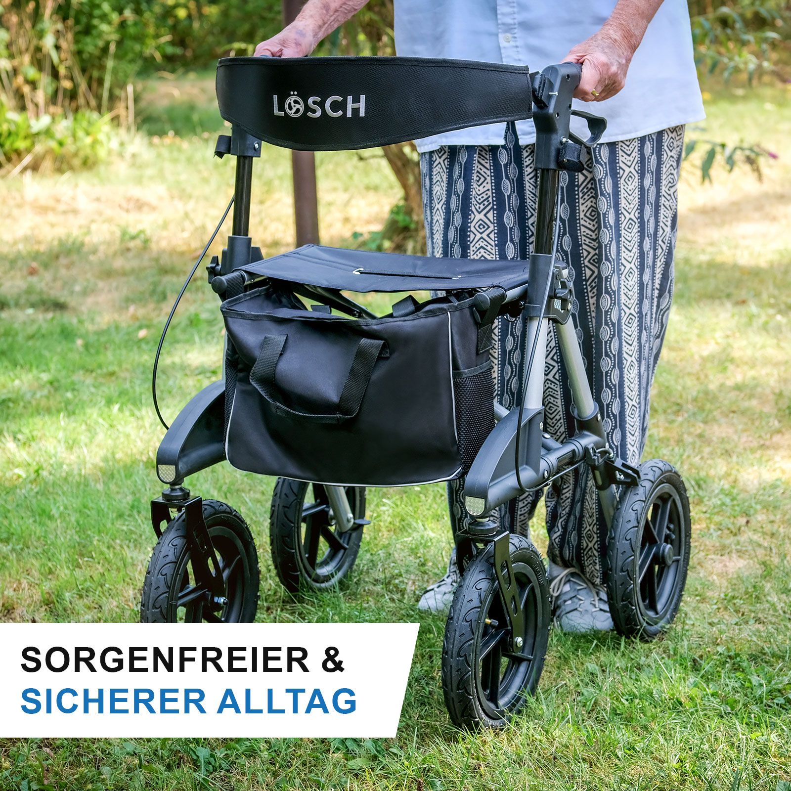 Person mit Rollator im Freien. Schwarzer Rollator mit Tasche und Sitz. Text: Sorgenfreier & sicherer Alltag.