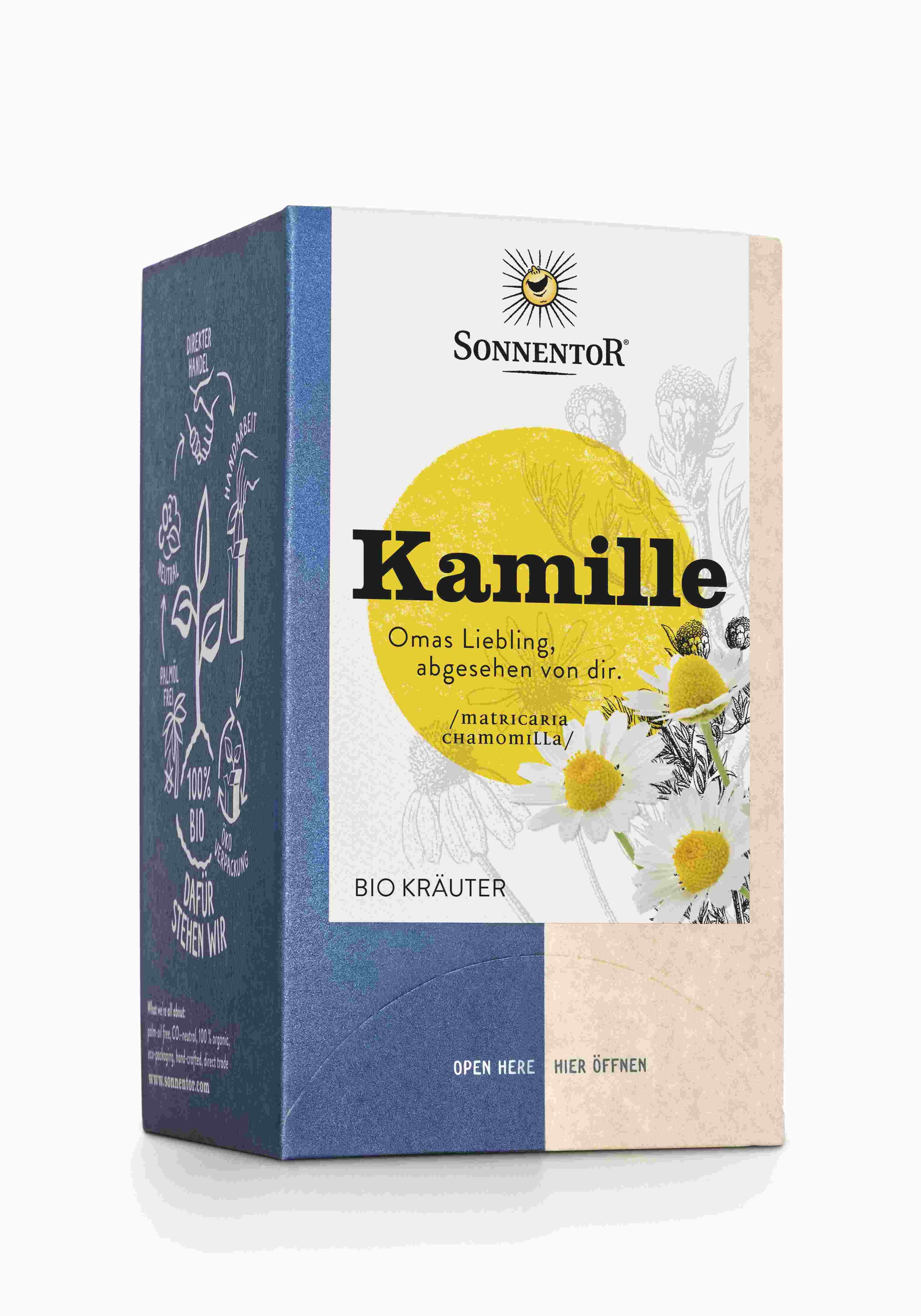 Karton mit SonnentoR Kamille Tee. Aufschrift: Kamille, Bio Kräuter. Abbildung von Kamillenblüten und gelbem Kreis.