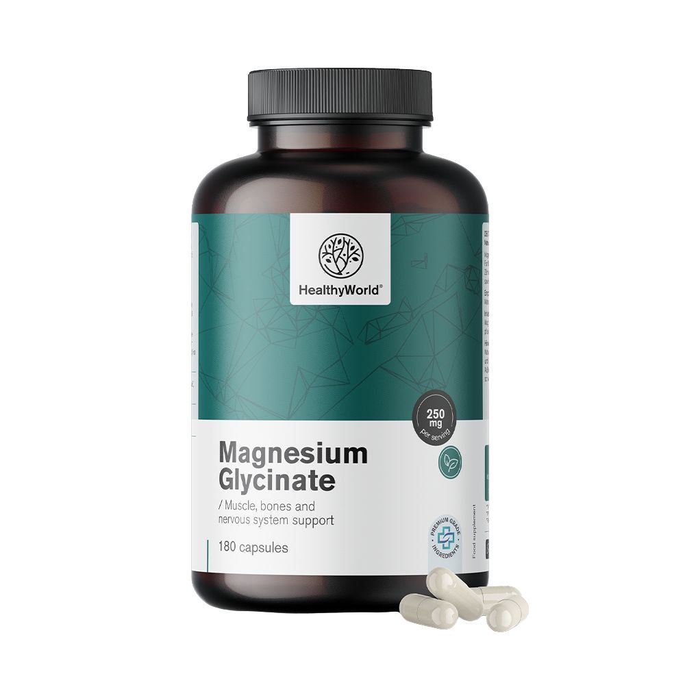 Braune Flasche mit grüner Banderole. Aufschrift: Magnesium Glycinat, 250 mg, 180 Kapseln. Weiße Kapseln liegen daneben.