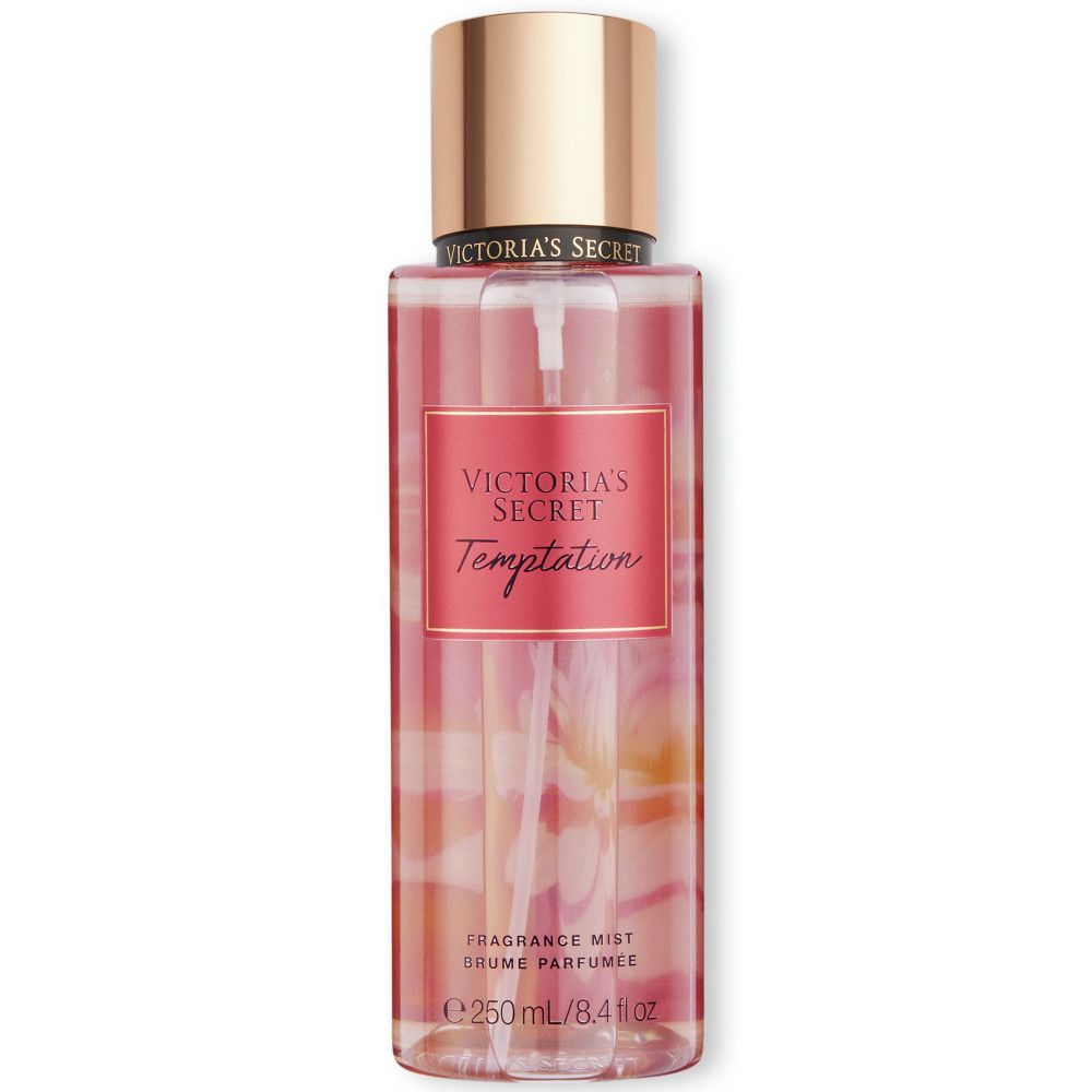 Victoria's Secret Temptation Fragrance Mist Spray. Rosa Flasche mit goldfarbenem Deckel. Text: Victoria's Secret, Temptation.