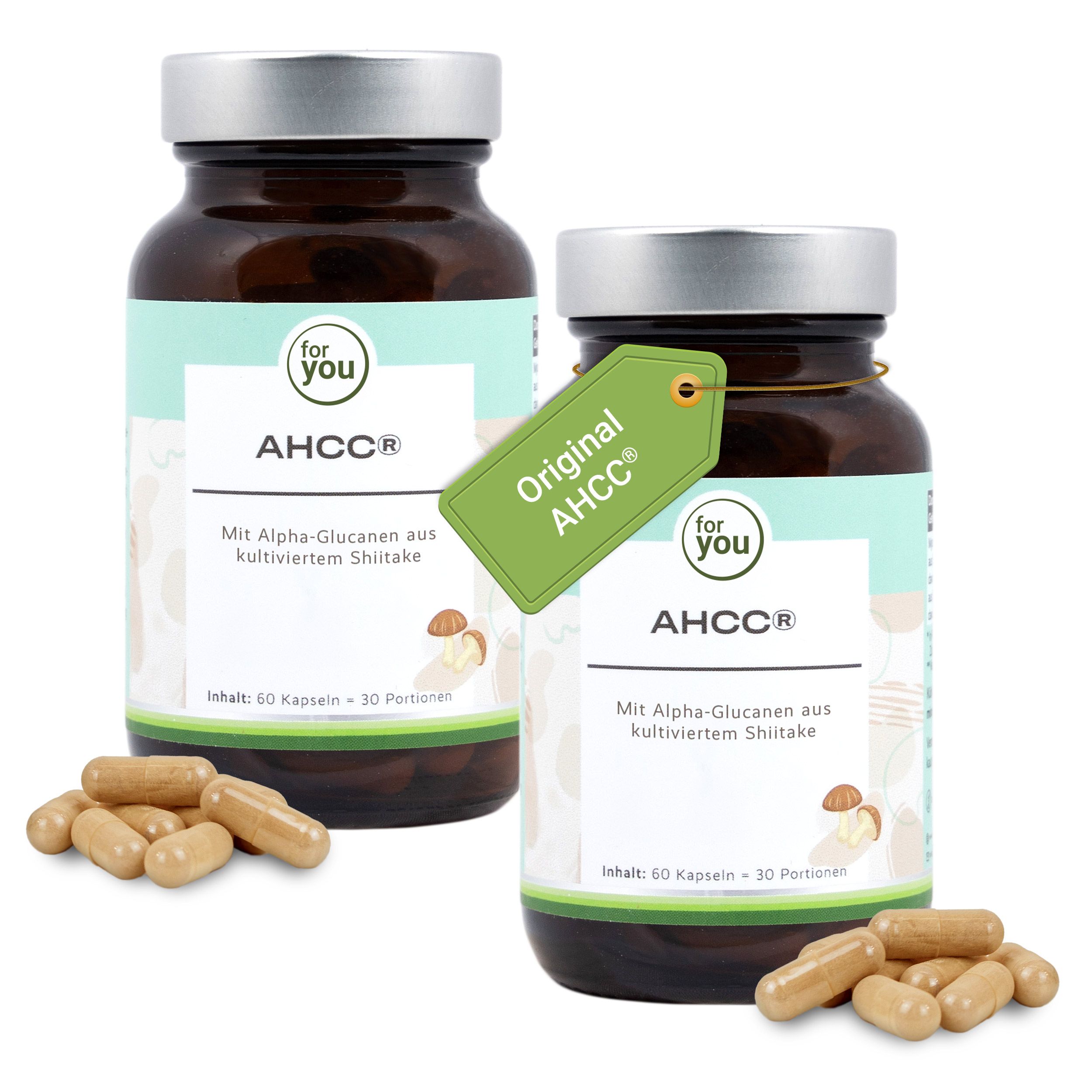 Zwei Flaschen AHCC® Kapseln mit Shiitake-Extrakt und Kapseln auf dem Tisch.