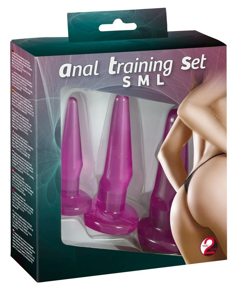 Verpackung mit drei violetten Anal-Plugs. Aufschrift: 'anal training Set SML'.