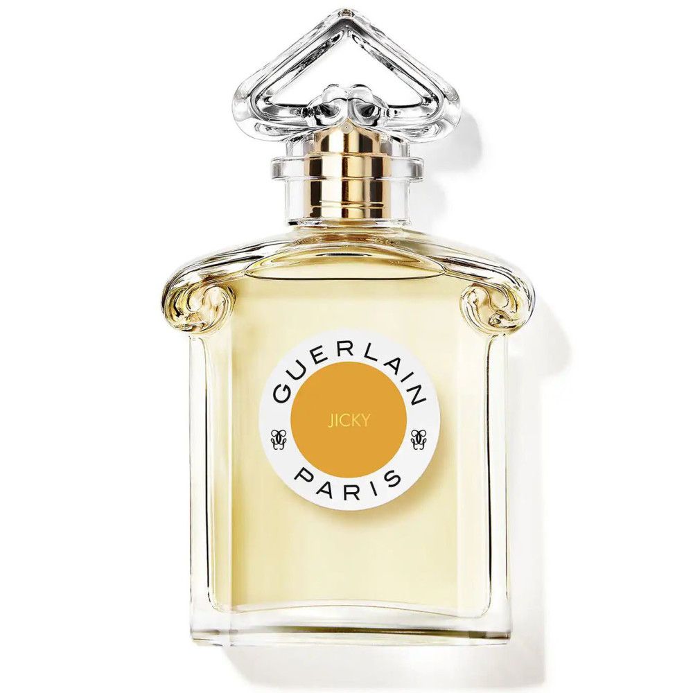 Parfümflakon mit rundem Etikett. Aufschrift: GUERLAIN PARIS, JICKY. Transparenter Flakon.