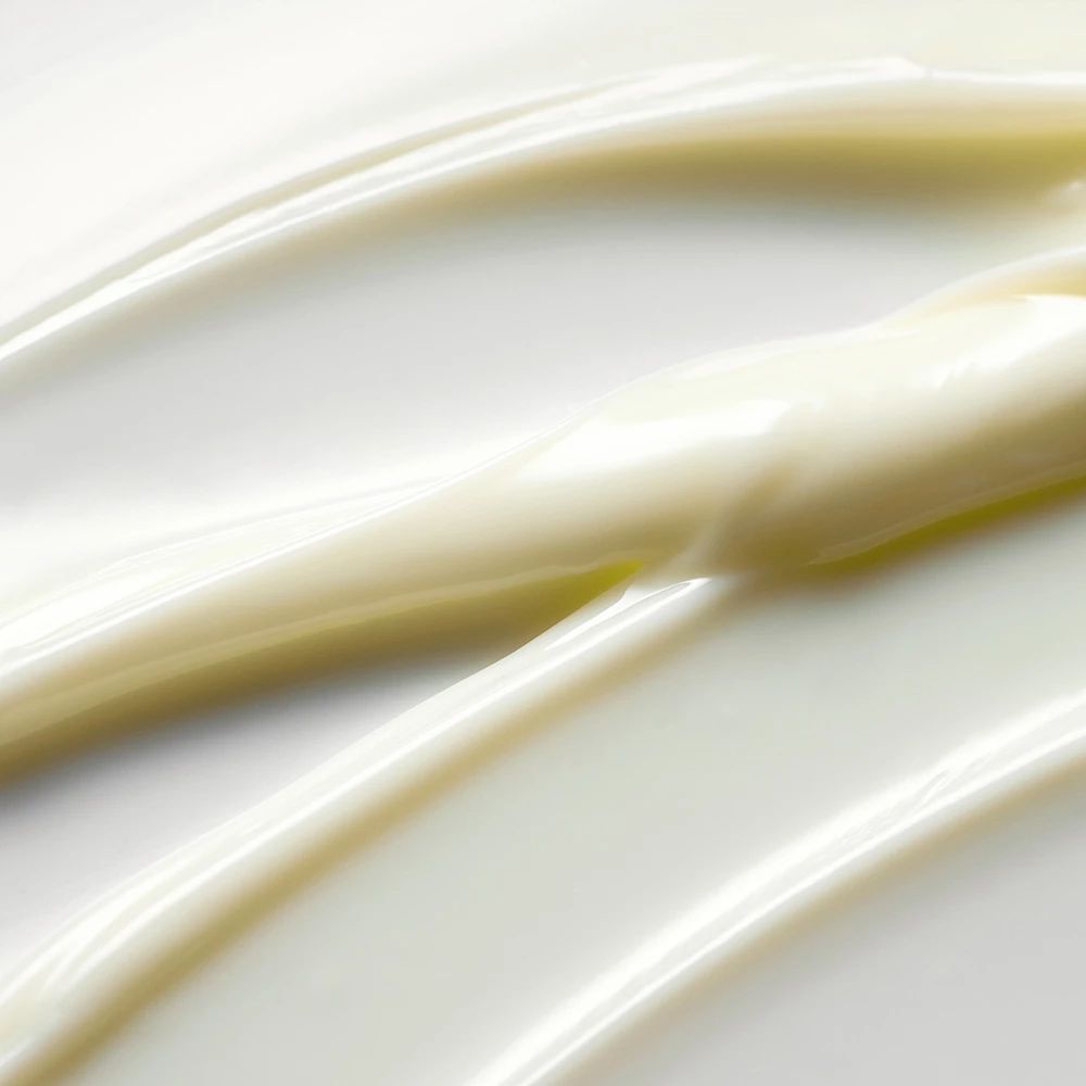 Nahaufnahme von Creme-Streifen. Glatte, weiße Textur.