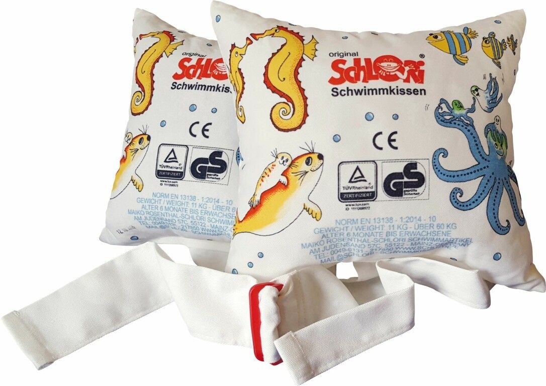 Zwei weiße Schwimmkissen mit maritimen Motiven und CE-GS-Siegeln. Inklusive weißem Gurt mit rotem Verschluss.