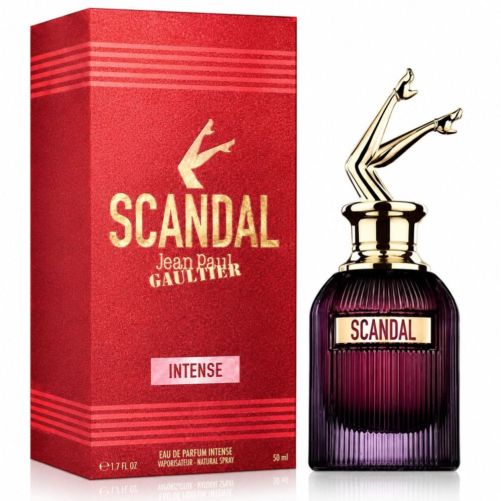 Rote Schachtel mit "SCANDAL" und Jean Paul Gaultier Schriftzug. Daneben die passende lila Flasche.