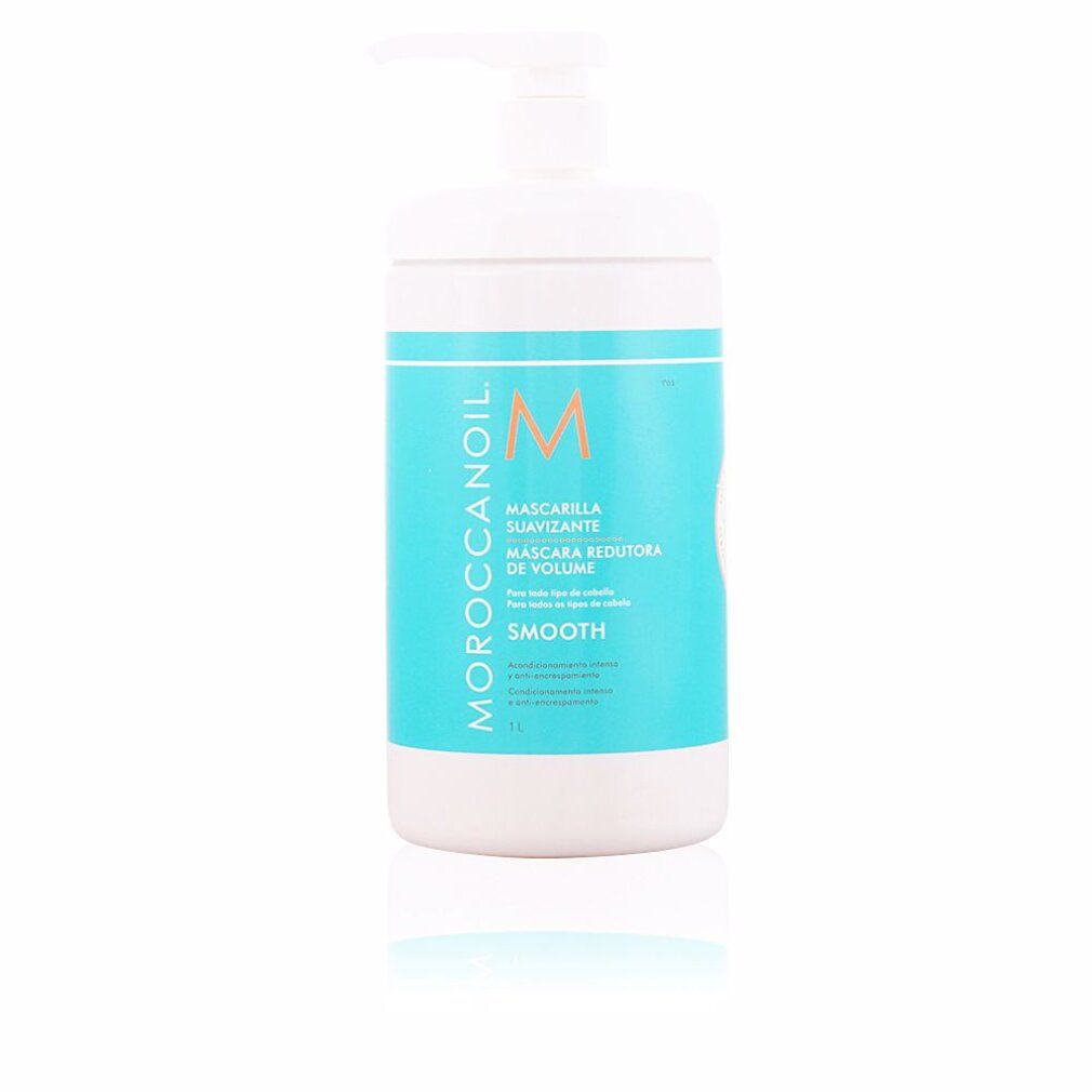 Weißer Behälter mit blauem Etikett. Aufschrift: Moroccanoil, Mascarilla Suavizante, M. Mit Pumpe.