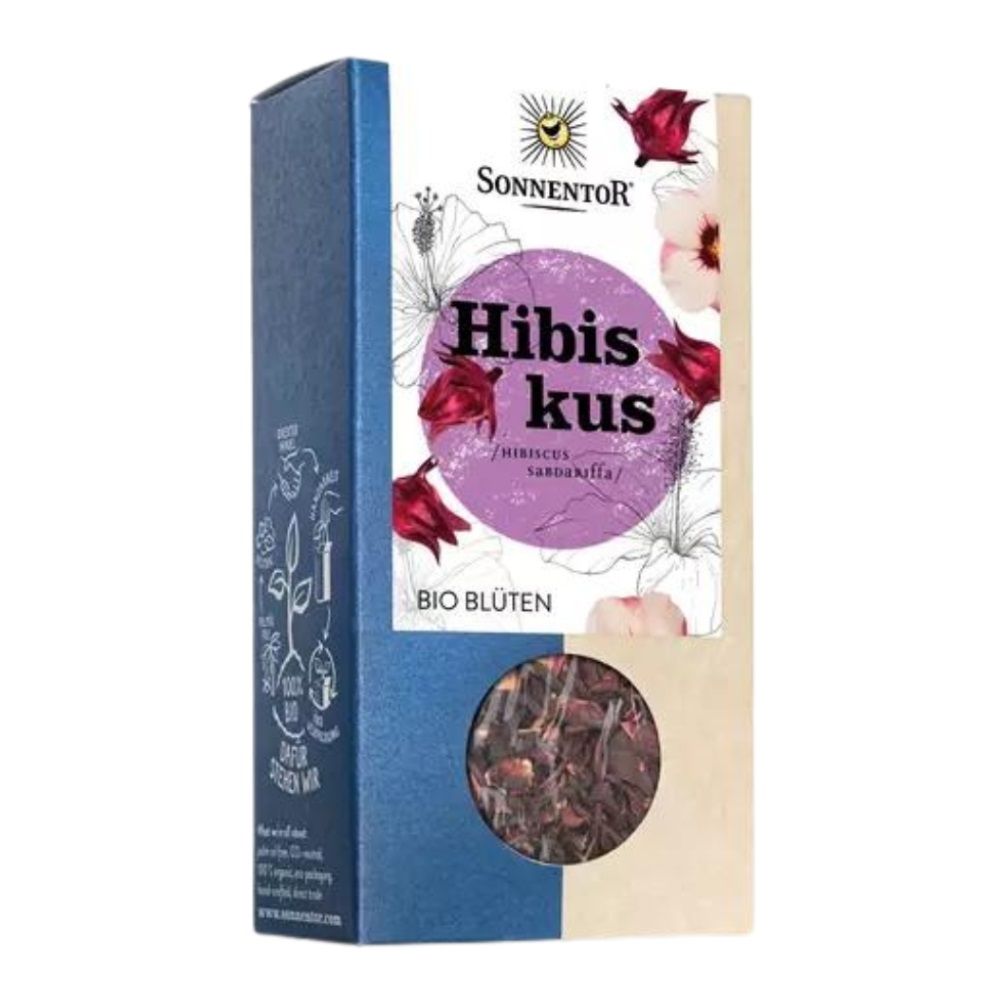 Kartonverpackung mit Hibiskusblüten. Aufschrift: SonnentoR, Hibiskus, Bio Blüten. Sichtfenster mit Blüten. Blaue und beige Farbtöne.
