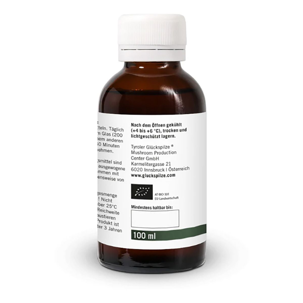 Rückansicht einer braunen Glasflasche mit weißem Deckel. Etikett mit Text und "100 ml" Angabe.