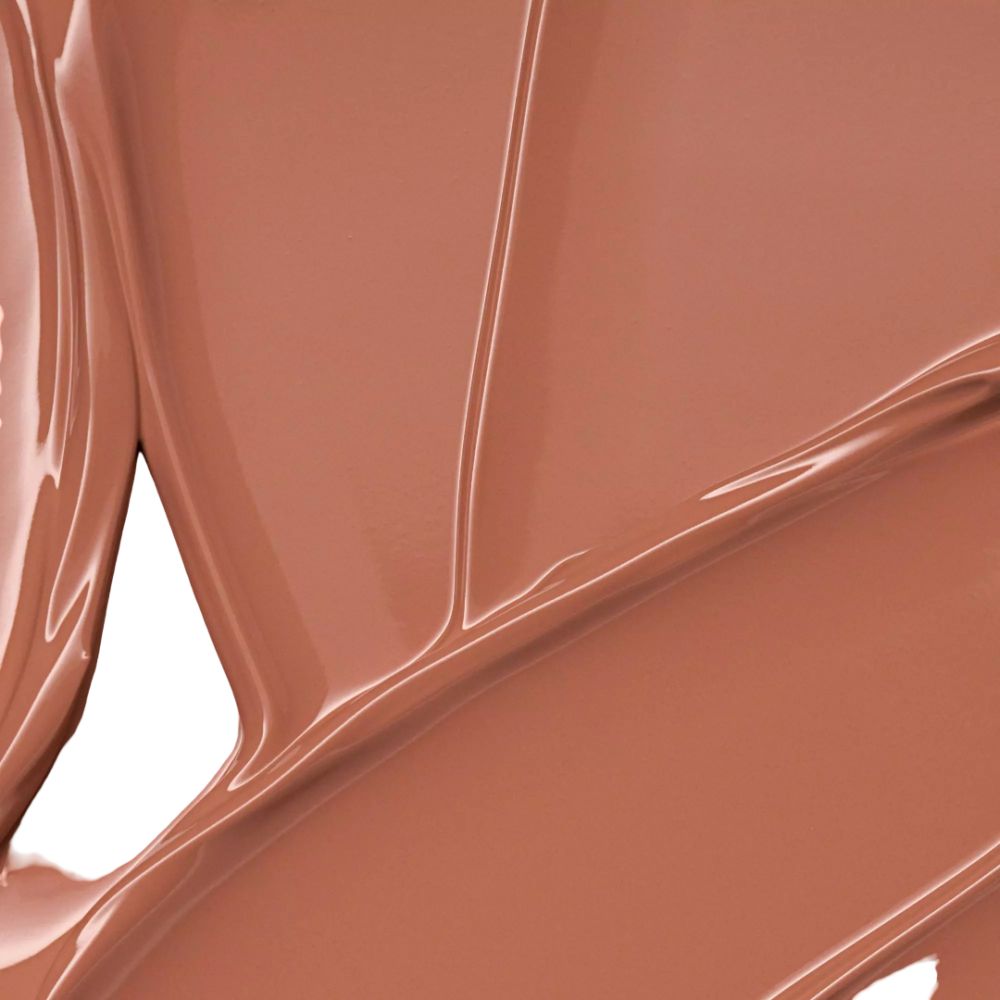 Nahaufnahme von Lippenstift-Swatches. Glänzende, braune Farbe.